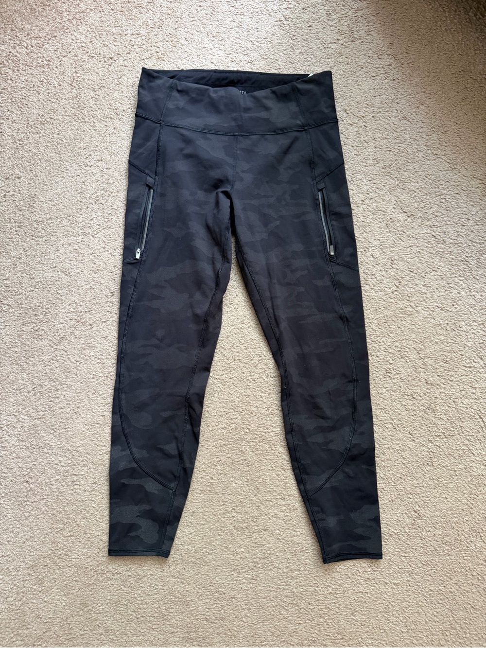 Athleta Black Camo High-Rise Leggings with Zippered Side Pockets